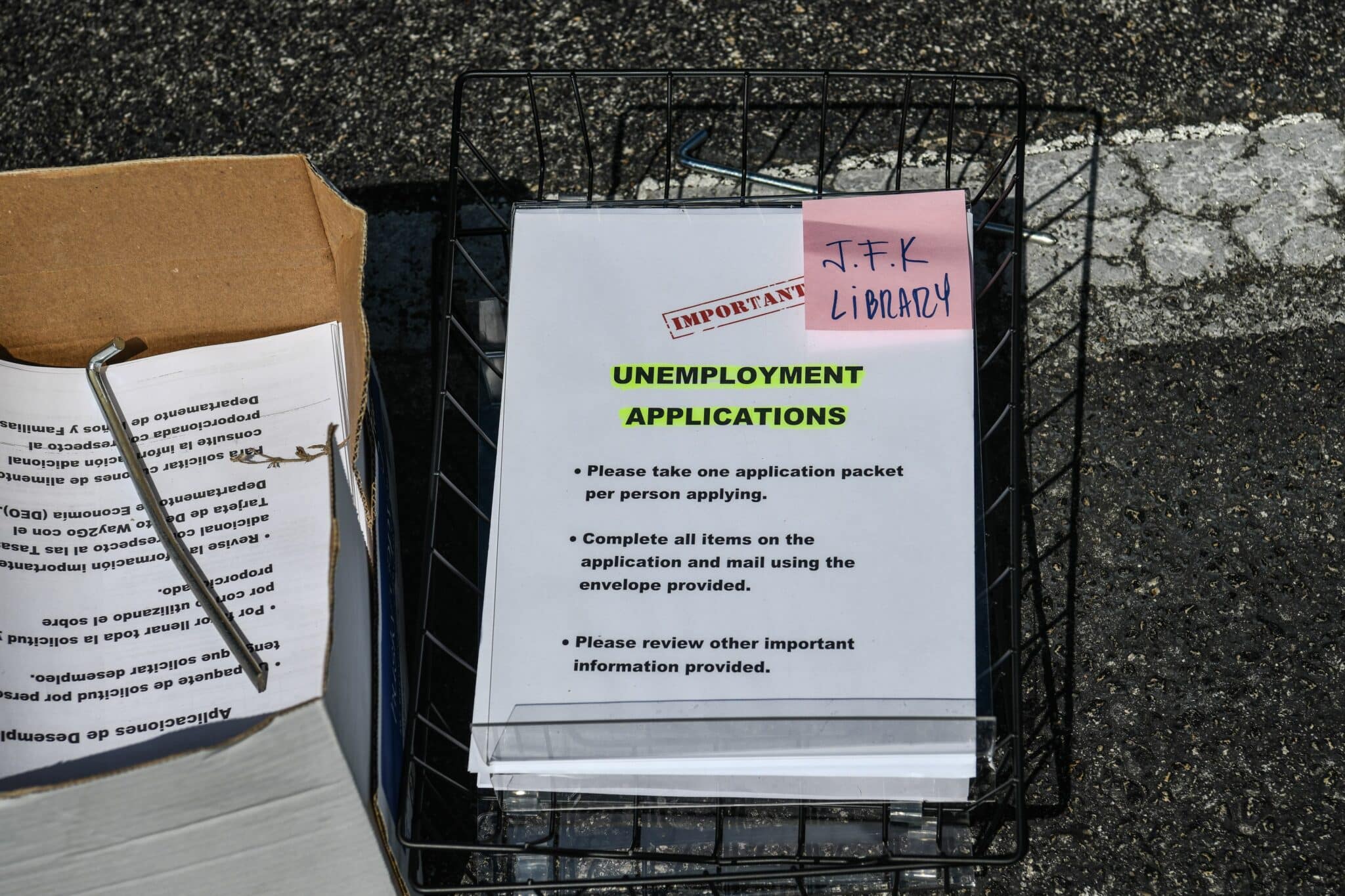 Unemployment forms are seen kept at a drive thru collection point outside John F. Kennedy Library in Hialeah, Florida, on April 8, 2020. (Photo by CHANDAN KHANNA / AFP) (Photo by CHANDAN KHANNA/AFP via Getty Images)
