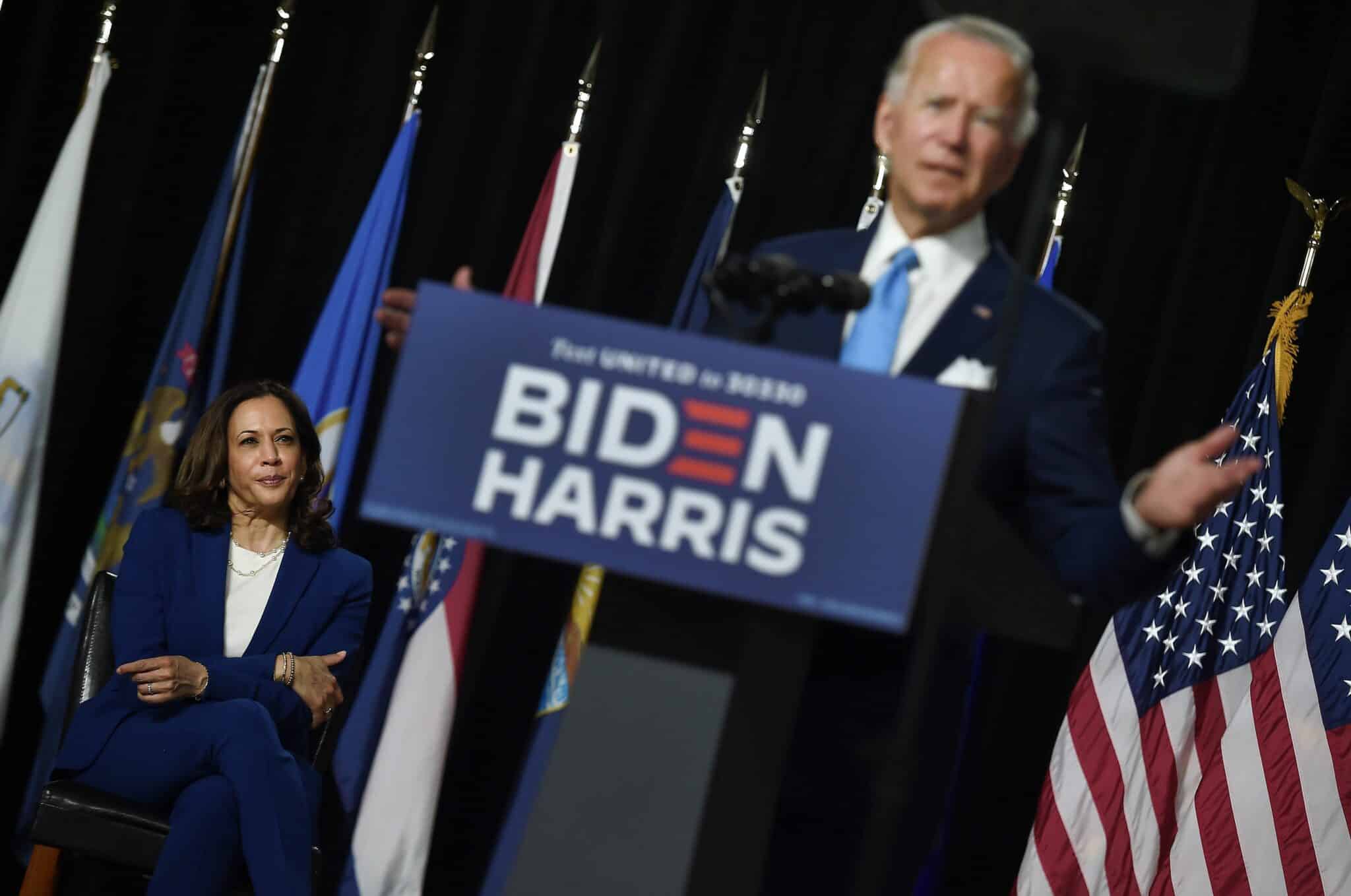 Democratic vice presidential running mate, US Senator Kamala Harris, listens to presidential nominee and former US Vice President Joe Biden speak during their first press conference together in Wilmington, Delaware, on August 12, 2020. (Photo by Olivier DOULIERY / AFP) (Photo by OLIVIER DOULIERY/AFP via Getty Images)