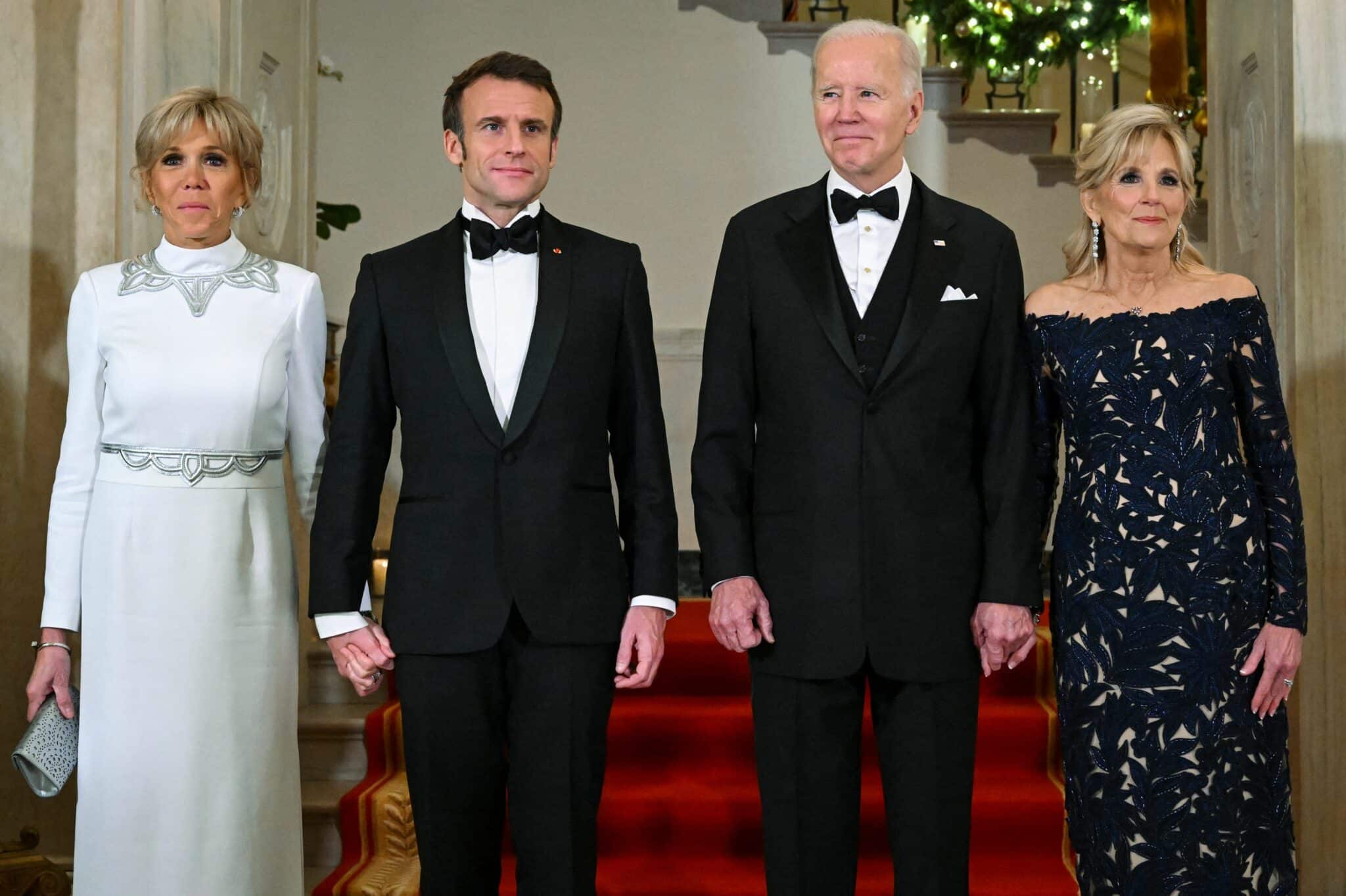 US President Joe Biden and First Lady Jill Biden welcome French President Emmanuel Macron and his wife Brigitte Macron to the White House for a state dinner in Washington, DC, on December 1, 2022. (Photo by SAUL LOEB / AFP) (Photo by SAUL LOEB/AFP via Getty Images)