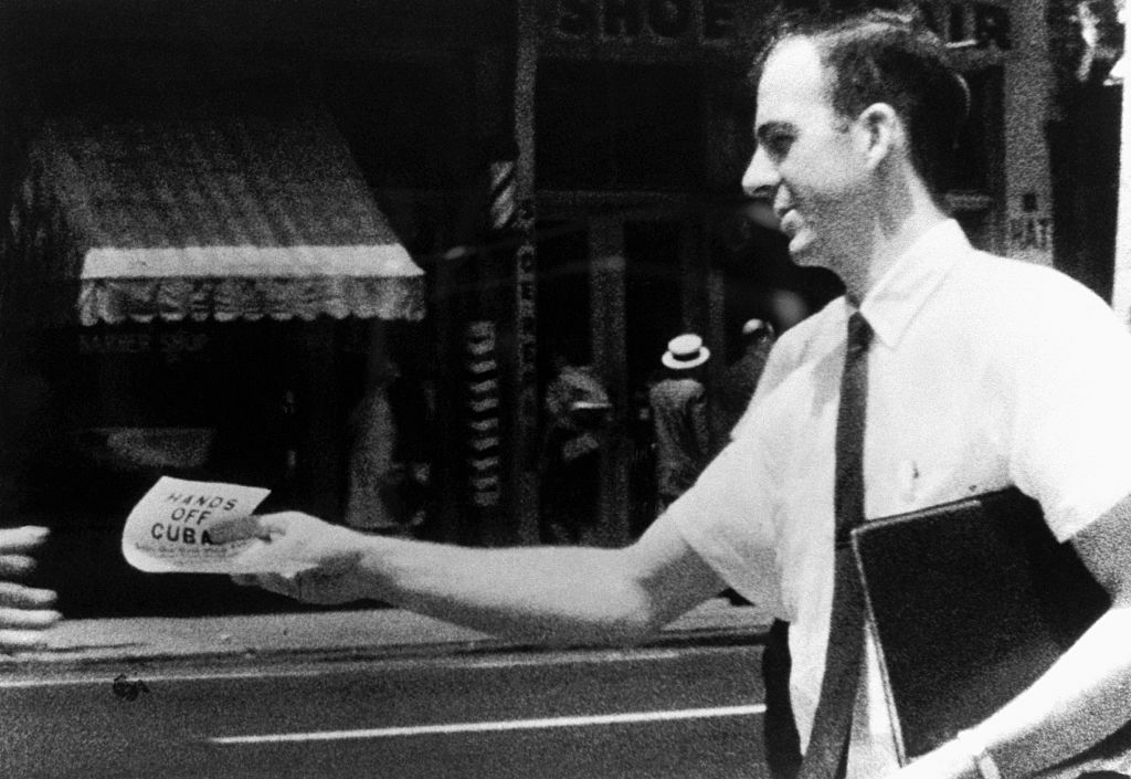 Lee Harvey Oswald distributes Hands Off Cuba flyers on the streets of New Orleans, Louisiana. This photograph was used in the Kennedy assassination investigation. (Photo by © CORBIS/Corbis via Getty Images)