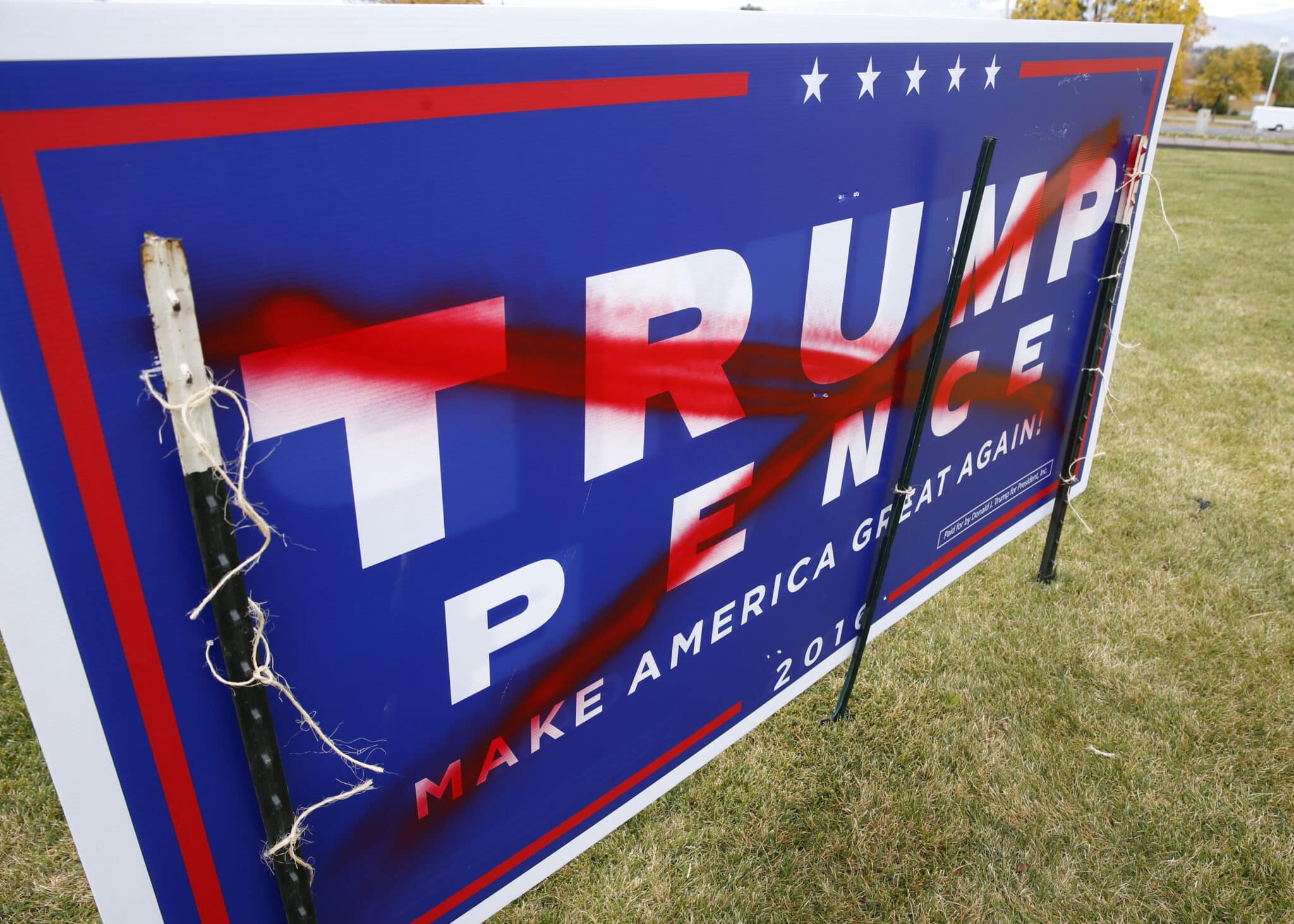 A Donald Trump sign is vandalized at a home on November 1, 2016 in Provo, Utah.

Polls show US independent presidential candidate Evan McMullin in a tie with US Republican presidential candidate Donald Trump in Utah. / AFP / GEORGE FREY        (Photo credit should read GEORGE FREY/AFP via Getty Images)