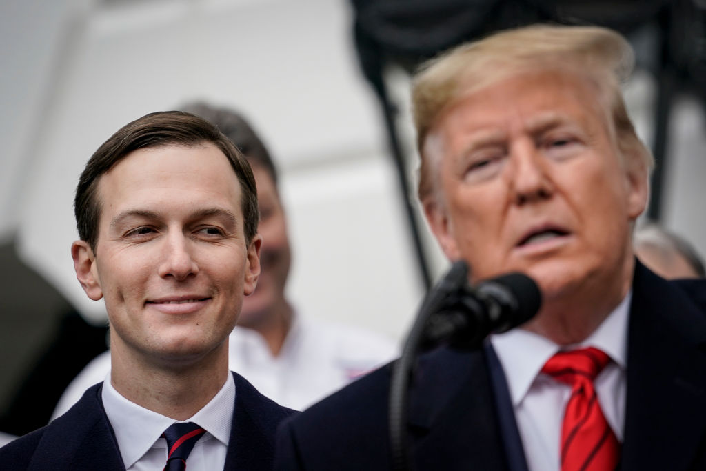 WASHINGTON, DC - JANUARY 29: (L-R) Senior Advisor Jared Kushner looks on as U.S. President Donald Trump speaks before signing the United States-Mexico-Canada Trade Agreement (USMCA) during a ceremony on the South Lawn of the White House on January 29, 2020 in Washington, DC. The new U.S.-Mexico-Canada Agreement (USMCA) will replace the 25-year-old North American Free Trade Agreement (NAFTA) with provisions aimed at strengthening the U.S. auto manufacturing industry, improving labor standards enforcement and increasing market access for American dairy farmers.  The USMCA signing is considered one of President Trump's biggest legislative achievements since Democrats took control of the House in 2018. (Photo by Drew Angerer/Getty Images)