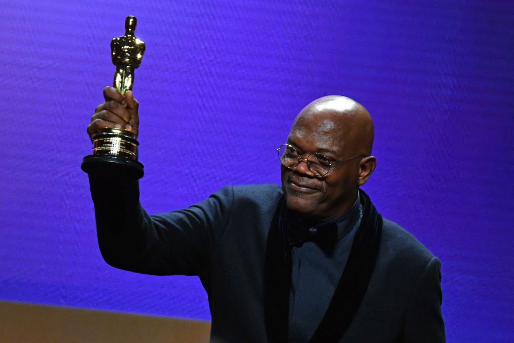 US actor Samuel L Jackson holds up his honorary Oscar onstage during the Academy Of Motion Picture Arts And Sciences' 12th Annual Governors Awards at the Ray Dolby Ballroom at Hollywood & Highland Center in Hollywood, California on March 25, 2022. (Photo by ANGELA  WEISS / AFP) (Photo by ANGELA  WEISS/AFP via Getty Images)