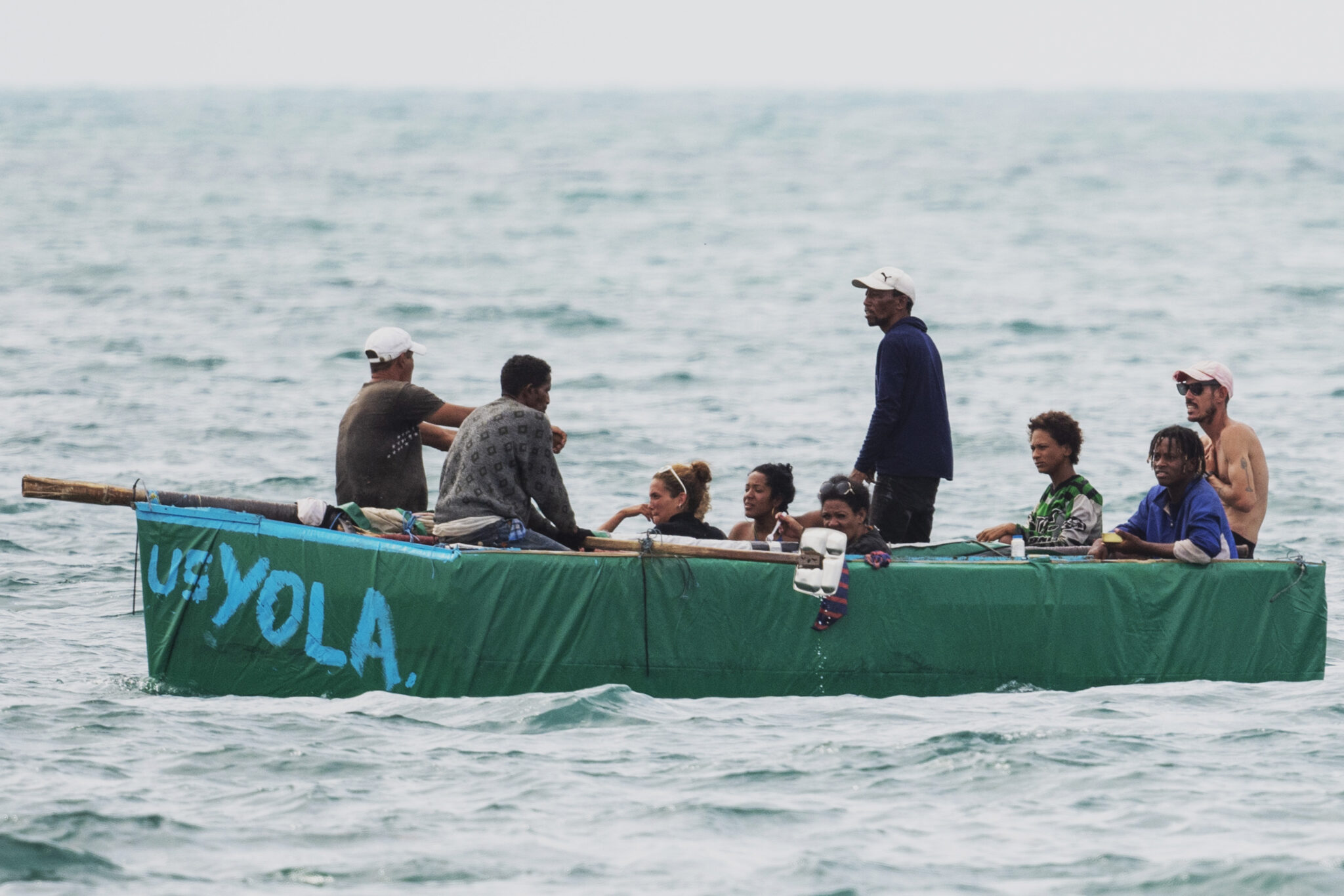 Cuban migrants row toward Stock Island, near Key West, Fla., Friday, Aug. 12, 2022. The number of Cubans leaving the island will reach an all-time high this year. The U.S. Coast Guard has intercepted many at sea, but many more are crossing the U.S.-Mexican border. (AP Photo/Mary Martin)