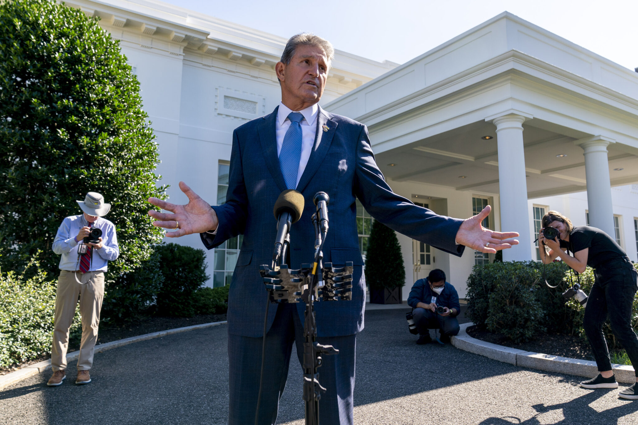 Sen. Joe Manchin, D-W.Va., speaks to reporters outside the West Wing of the White House in Washington, Tuesday, Aug. 16, 2022, after President Joe Biden signed the Democrats' landmark climate change and health care bill. (AP Photo/Andrew Harnik)