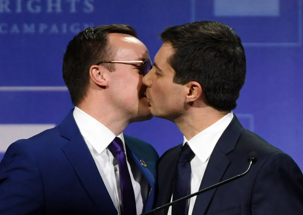 LAS VEGAS, NEVADA - MAY 11:  Chasten Glezman Buttigieg (L) kisses his husband, South Bend, Indiana Mayor Pete Buttigieg, after he delivered a keynote address at the Human Rights Campaign's (HRC) 14th annual Las Vegas Gala at Caesars Palace on May 11, 2019 in Las Vegas, Nevada. Buttigieg is the first openly gay candidate to run for the Democratic presidential nomination. The HRC is the largest LGBTQ advocacy group in the United States.  (Photo by Ethan Miller/Getty Images)