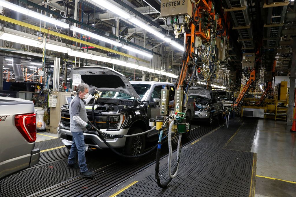 An employee works on the 40 millionth Ford Motor Co. F-Series truck on the assembly line at the Ford Dearborn Truck Plant on January 26, 2022 in Dearborn, Michigan. - The 40 millionth is a F-150, Tremor model in Iconic Silver and will be delivered to a customer in Texas. (Photo by JEFF KOWALSKY / AFP) (Photo by JEFF KOWALSKY/AFP via Getty Images)