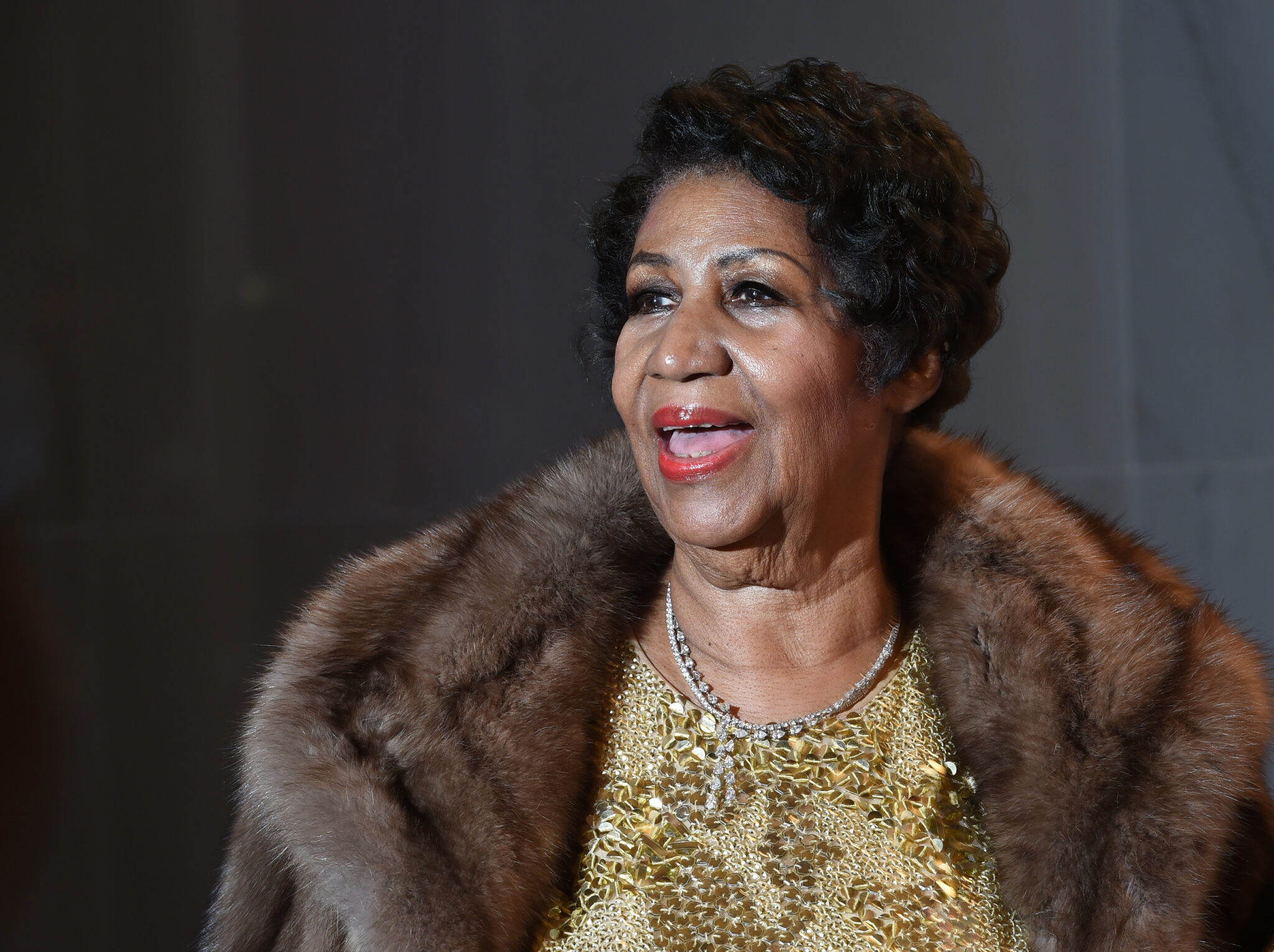 Aretha Franklin poses on the red carpet before the 38th Annual Kennedy Center Honors December 6, 2015 in Washington, DC.  AFP PHOTO/MOLLY RILEY (Photo by MOLLY RILEY / AFP)        (Photo credit should read MOLLY RILEY/AFP via Getty Images)