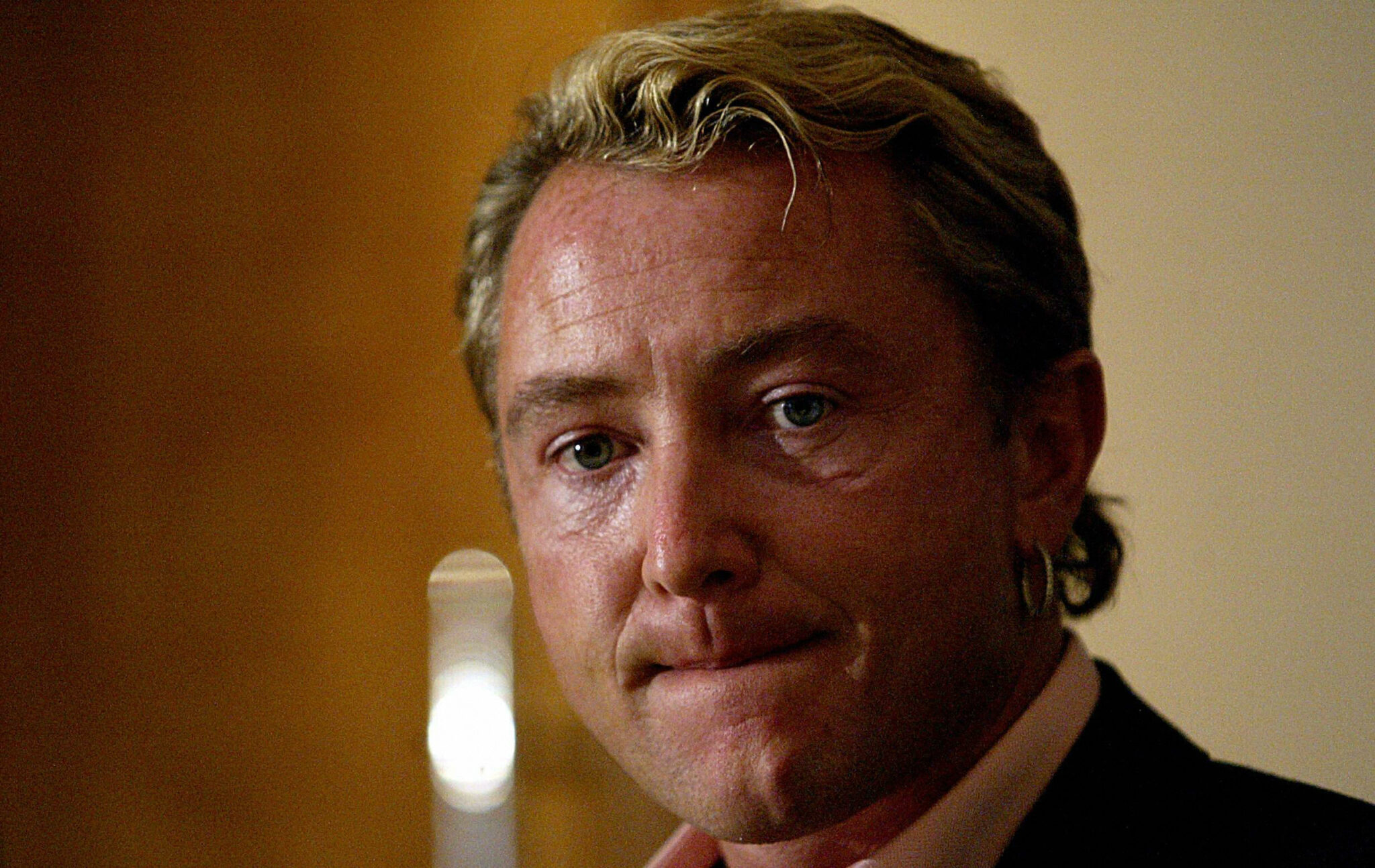 JOHANNESBURG, SOUTH AFRICA:  Founder of Irish company Lord of the Dance, Michael Flatley, addresses a press conference 28 June 204 in Johannesburg, following the murder of one of his company members, Daryl Kempster. Kempster was shot 26 June night as he was returning from the Civic Theatre to the nearby Parktonian Hotel in the business district of Johannesburg, where the cast and crew were staying.  . AFP PHOTO /Alexander Joe  (Photo credit should read ALEXANDER JOE/AFP via Getty Images)