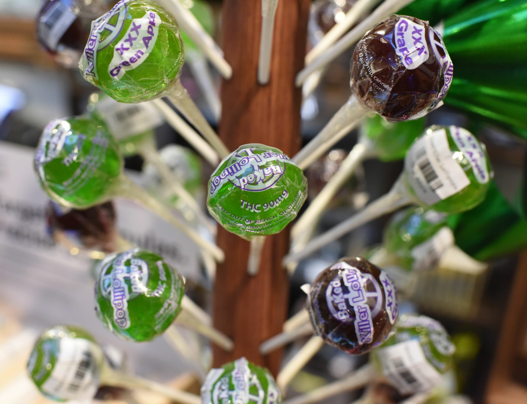 BaKed Lollipops with 90mg each of THC, the chemical component in cannabis responsible for making users high, are for sale at the Higher Path medical marijuana dispensary in the San Fernando Valley area of Los Angeles, California, December 27, 2017. - At the stroke of midnight on January 1, pot lovers in California may raise a joint, instead of a glass of champagne. America's wealthiest state is legalizing the growth, sale and consumption of recreational marijuana, opening the door to the world's biggest market. (Photo by Robyn Beck / AFP)        (Photo credit should read ROBYN BECK/AFP via Getty Images)