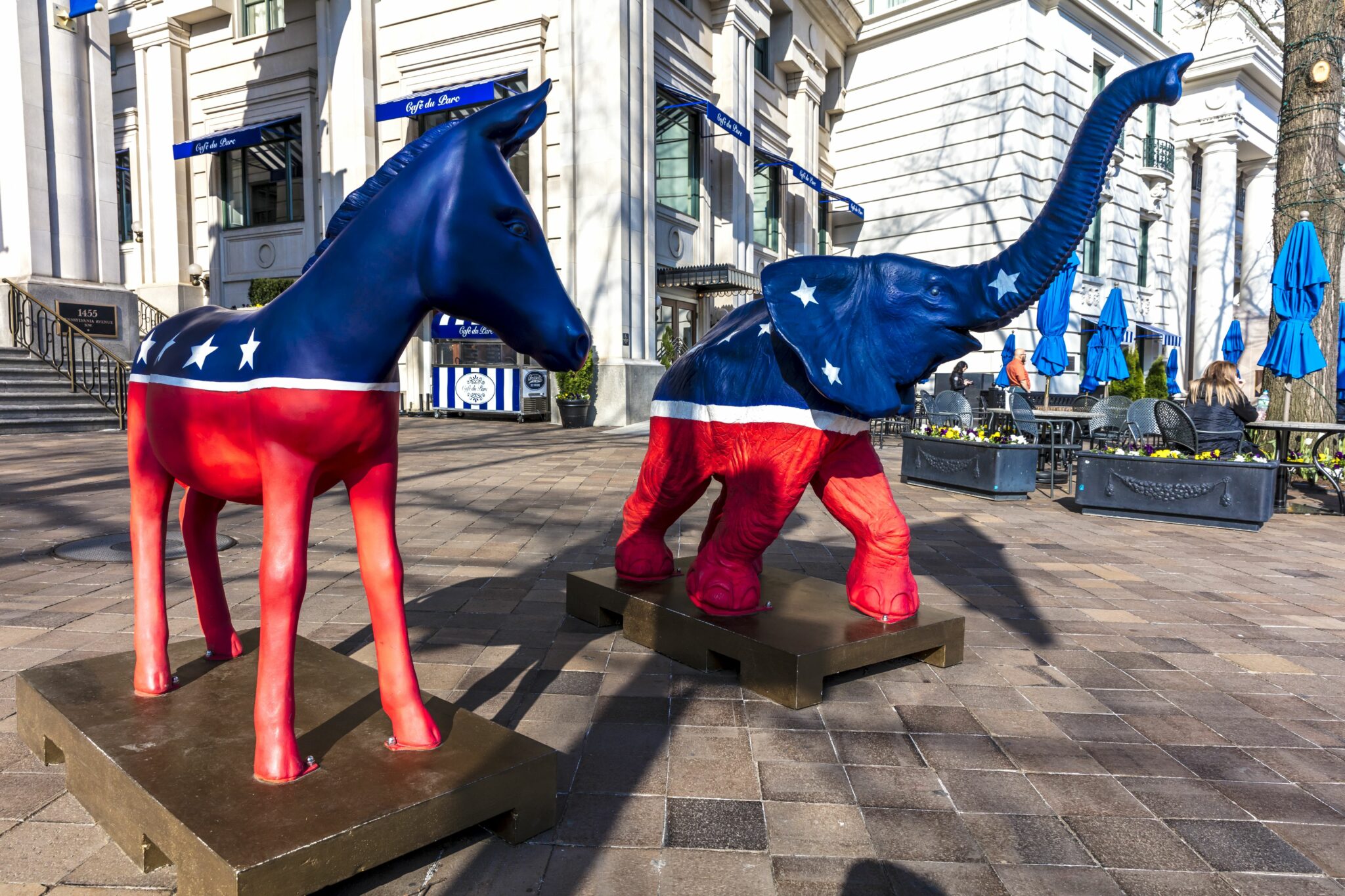 WASHINGTON DC, Democratic Mule and Republican Elephant statues symbolize American 2-part Political system in front of Willard Hotel. (Photo by: Visions of America/Universal Images Group via Getty Images)