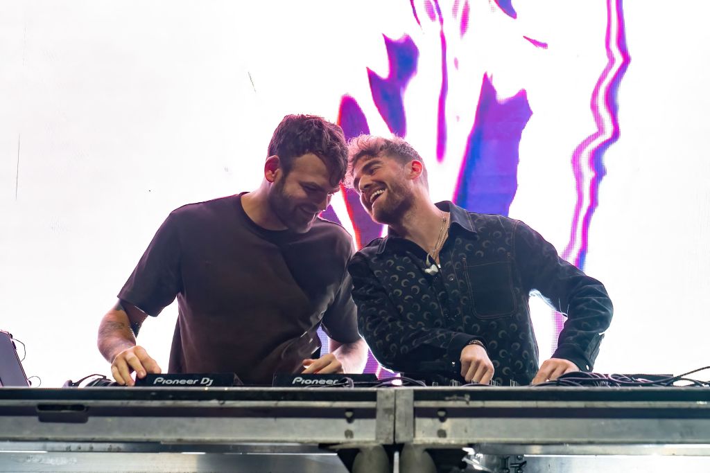 Alex Pall (L) and Andrew Taggart of The Chainsmokers perform onstage during the Bootsy Bellows x Sports Illustrated Circuit Series After Party at Austin American Statesman in Austin, Texas on October 23, 2021. (Photo by SUZANNE CORDEIRO / AFP) (Photo by SUZANNE CORDEIRO/AFP via Getty Images)