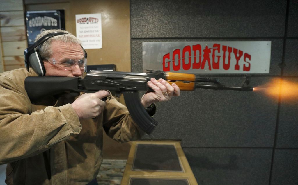 OREM, UT - FEBRUARY 21: Vince Warner fires an AK-47 with a bump stock installed at Good Guys Gun and Range on February 21, 2018 in Orem, Utah. The bump stock is a device when installed allows a semi-automatic to fire at a rapid rate much like a fully automatic gun. (Photo by George Frey/Getty Images)